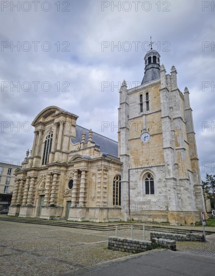 Notre-Dame Cathedral in Le Havre, France. The architecture contrast from ornate Baroque main facade alongside an older Renaissance and Gothic bell tower, Le Havre, Normandy, France