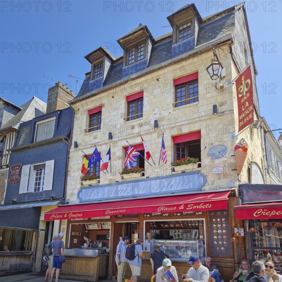 Honfleur, Normandy, France, May 30, 2025: La Maison Bleue a charming brasserie and creperie in the historic french town, Honfleur, Normandy, France