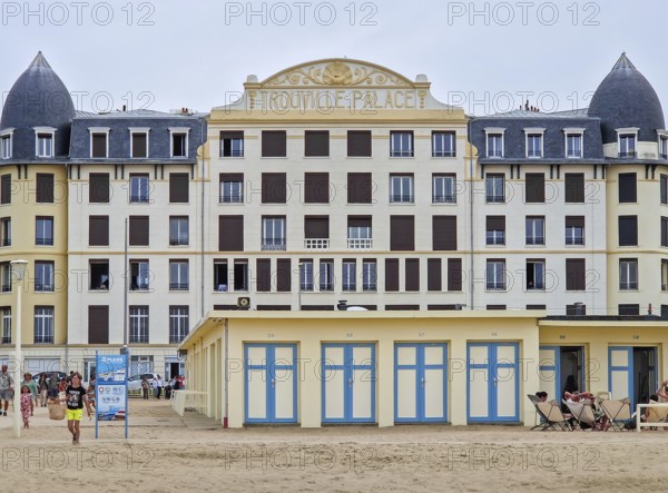 Trouville-sur-Mer, Normandy, France, May 31, 2025: the iconic Trouville Palace hotel, a grand, traditional seaside building marked by rows of windows with dark shutters, Trouville-sur-Mer, France