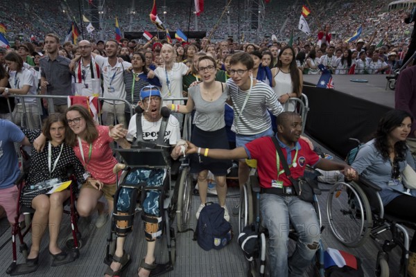 WROCLAW, POLAND - JULY 23, 2016: Pilgrims of the World Youth Day during concert Singing Europe. The concert is part of the Days in the Dioceses of World Youth Day and the European Capitol of Culture