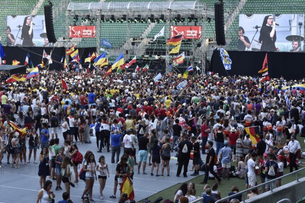 WROCLAW, POLAND - JULY 23, 2016: Pilgrims of the World Youth Day during concert Cristina Scuccia. The concert is part of the Days in the Dioceses of World Youth Day and the European Capitol of Culture