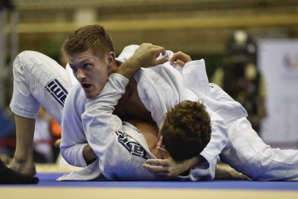 WROCLAW, POLAND - JULY 29, 2017: Ju-Jitsu Ne-Waza during the The World Games 2017. Fight between Maciej Kozak POL (RED) vs Evyatar Peperni ISR (BLUE)