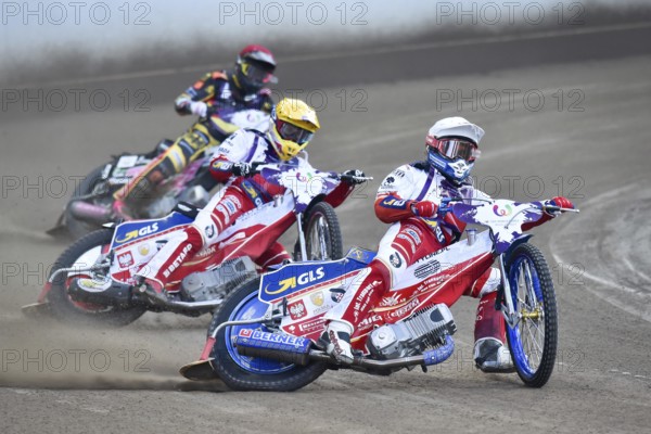WROCLAW, POLAND - JULY 29, 2017: Speedway couple turnament race Germany - Poland during The World Games 2017. In action Bartosz Zmarzlik (W), Maciej Janowski (Y) and Kai Huckenbeck (R)