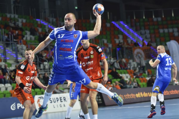 LUBIN, POLAND - OCTOBER 27, 2016: Polish PGNiG Superleague men in handball match between MKS Zaglebie Lubin - MMTS Kwidzyn 24:25. In action Mateusz Seroka