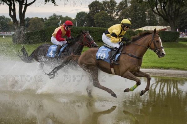 WROCLAW, POLAND - SEPTEMBER 4, 2016: Horse racing - Grand Wroclawska Prize Airport Wroclaw. In action N. Loven (L) on the horse Delight My Fire and M. Stromsky (R) on horse Sergeant Thunder