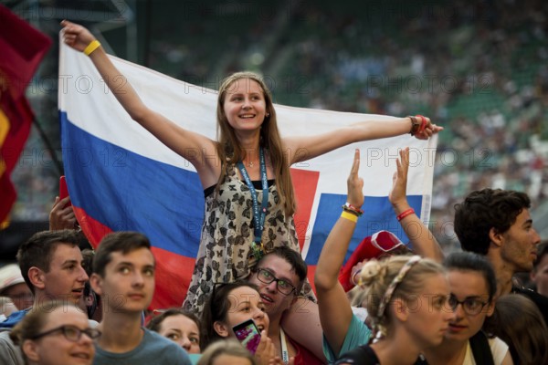 WROCLAW, POLAND - JULY 23, 2016: Pilgrims of the World Youth Day during concert Singing Europe. The concert is part of the Days in the Dioceses of World Youth Day and the European Capitol of Culture