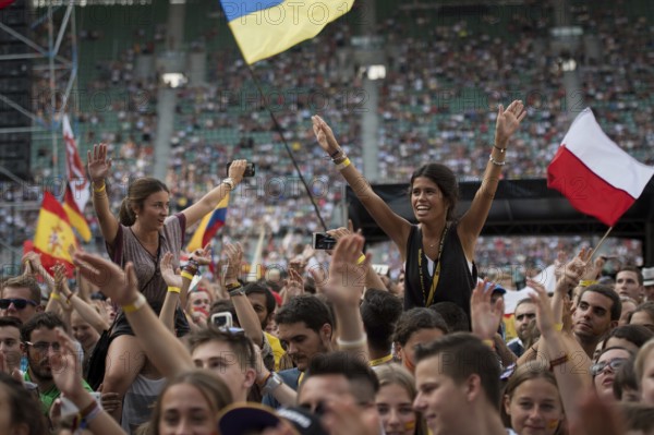 WROCLAW, POLAND - JULY 23, 2016: Pilgrims of the World Youth Day during concert Singing Europe. The concert is part of the Days in the Dioceses of World Youth Day and the European Capitol of Culture