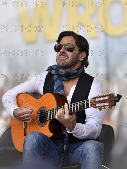 WROCLAW, POLAND - MAY 1, 2016: Al Di Meola during event Guitar Guinness World Record. Over 7 thousands guitarists achieve new Guiness Record playing Hey Joe by Jimi Hendrix