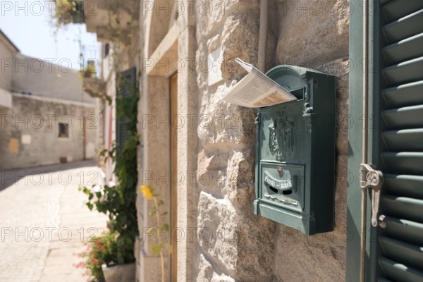 Mailbox. Purple home mailbox. Pink mailbox on Rovinj street, Croatia. Mediterranean style pink mailbox for newspapers and magazines, post office box free shipping