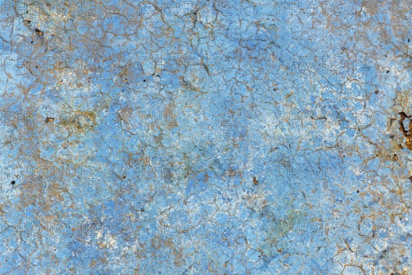 Light blue rusty vintage paint background, color on old pool bottom, brown, yellow, decay texture, autumn concept