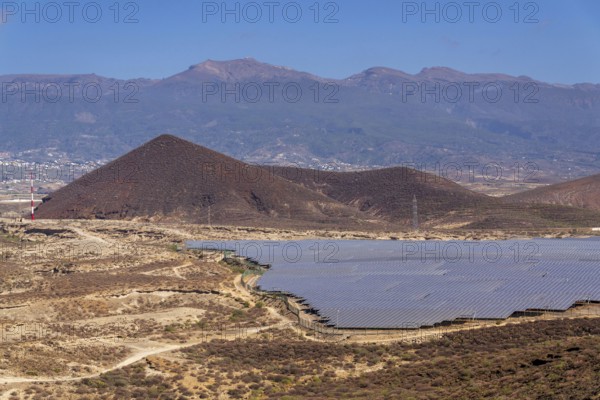 Solar panels at photovoltaic power station farm, future innovation energy concept Tenerife, Spain