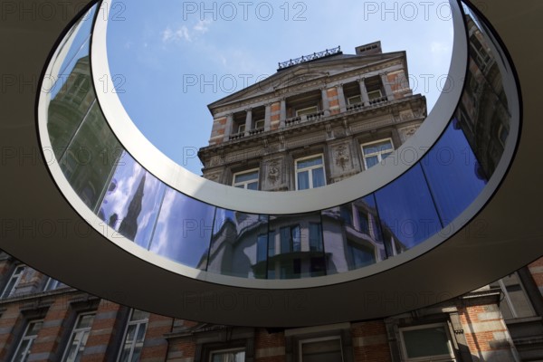 The round pedestrian bridge Passerelle Tondo connecting the Chamber of Representatives with Forum building, the Federal Government of Belgium, Brussels
