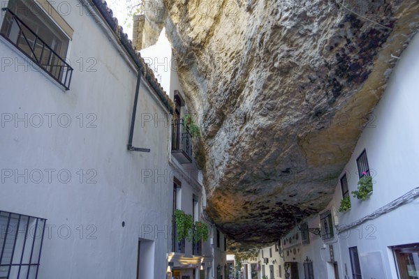 Setenil de las bodegas, cadiz, spain Houses in setenil de las bodegas, spain, built into a massive rock formation, creating a unique and historic landscape
