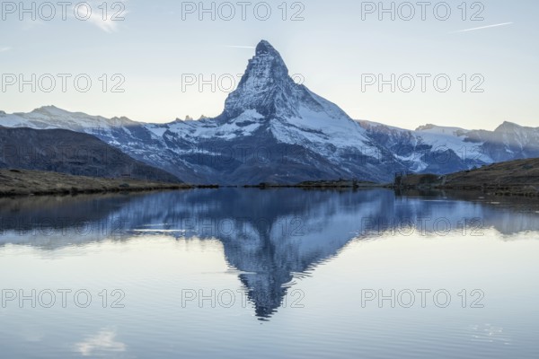 Matterhorn Mountain and Reflection in Lake Stellisee in Evening. Swiss Alps. Valais, Switzerland