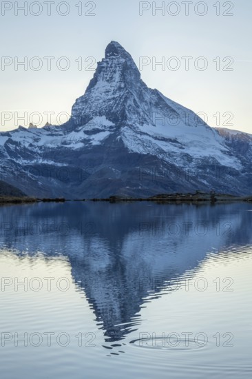 Matterhorn Mountain and Reflection in Lake Stellisee in Evening. Swiss Alps. Valais, Switzerland