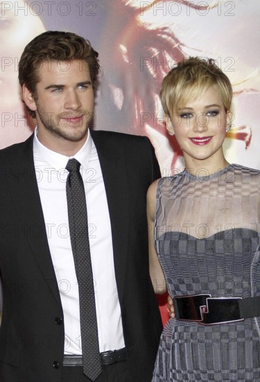 Liam Hemsworth, and Jennifer Lawrence at the Los Angeles premiere of 'The Hunger Games: Catching Fire' held at the Nokia Theatre L.A. Live in Los Angeles, USA on November 18, 2013, Los Angeles, CA, USA, Los Angeles, California, USA