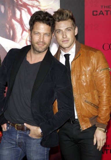 Nate Berkus and Jeremiah Brent at the Los Angeles premiere of 'The Hunger Games: Catching Fire' held at the Nokia Theatre L.A. Live in Los Angeles, USA on November 18, 2013, Los Angeles, CA, USA, Los Angeles, California, USA