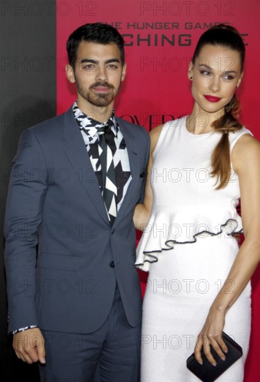 Joe Jonas at the Los Angeles premiere of 'The Hunger Games: Catching Fire' held at the Nokia Theatre L.A. Live in Los Angeles, USA on November 18, 2013, Los Angeles, CA, USA, Los Angeles, California, USA