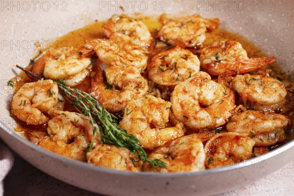 Shrimp dish cooked, in savory sauce. with fragrant herbs, and spices