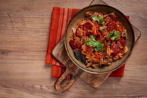Bigos, bigos Polish dish, stew with cabbage and chorizo sausages, mushrooms, homemade, no people