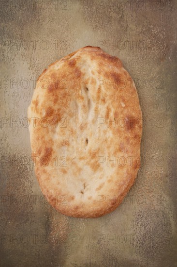 Georgian lavash bread, freshly baked, top view, on the table, no people