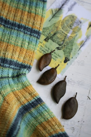 Handmade knitted sock with seeds