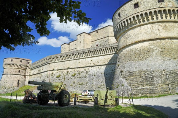 Round tower of the fortress with four guns, medieval fortress, San Leo fortress, San Leo, Emilia-Romagna, Italy
