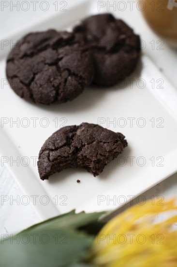 Chocolate chip cookies on a white plate