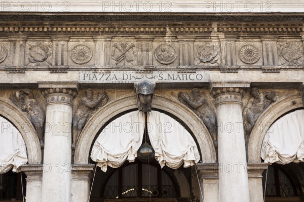 Details of buildings of Procurators with museums - Correr museum and National architecture museum on San Marco square, Venice, Italy
