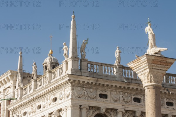Column of Saint Theodor and detail of library marchiala on San Marco square, Venice, Italy