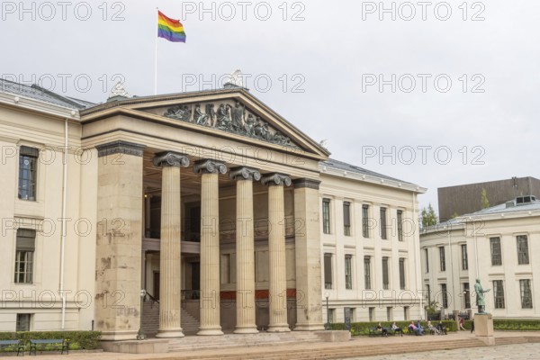 Domus Media, the University of Oslo building belonging to the Faculty of Law, where the Nobel Peace Prize used to be awarded in the past. It stands on University Square, near Karl Johans gate in the city centre. The rainbow flag, the LGBT pride flags, is hoisted at the top for the Oslo Pride summer festival. Oslo, Østlandet, Norway