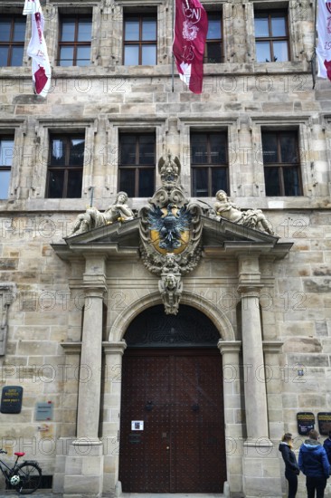 Coat of arms with eagle and allegorical figures, office of the Nuremberger Reichsschultheiß, old town hall, also Wolff'scher Bau, old town, Nuremberg, Middle Franconia, Bavaria, Germany