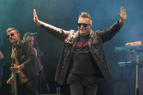 WROCLAW, POLAND - AUGUST 1, 2025: Music Festival Meskie Granie (Men's Playing). On the stage vocal Muniek Staszczyk and the band T.Love