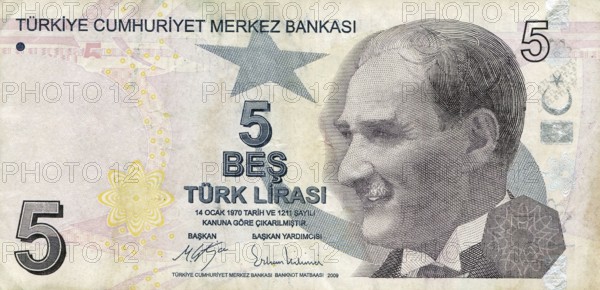 A paper banknote of 5 lira denomination issued by the Central Bank of Turkey for financial and trade and economic circulation. It features Kemal Atatürk, Turkey's political leader and ruler, who transformed the country from an empire into a republic