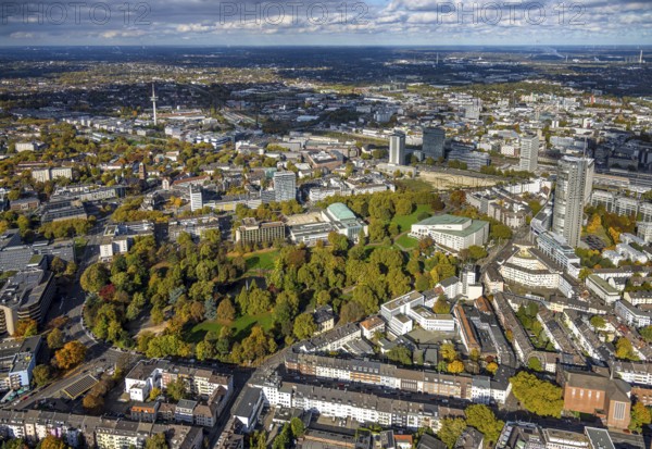 Aerial view, Essen Aalto Theatre and Essen Philharmonic in the Stadtgarten, Essen Campus construction site, telecommunications tower Telekom, view of the city, Südviertel, Essen, Ruhr area, North Rhine-Westphalia, Germany, trees in autumn colors, DE, Europe, events, autumn colors, autumn colors, autumn atmosphere, culture, art, aerial photography, aerial photography, theatre, overview, venue, birds-eyes view, autumnal tree-lined avenue, autumn trees, cultural use, overview