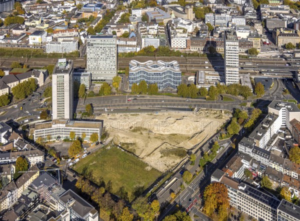 Aerial view, Essen Campus construction site at the main train station, innogy SE, Fakt Tower, DB Schenker and Postbank Hochhaus, Südviertel, Essen, Ruhr region, North Rhine-Westphalia, Germany, railway construction, building area, building plots, construction project, construction project, construction site, office building, DE, Deutsche Bahn AG, Europe, central station, aerial photo, aerial photography, aerial photography, new building, overview, birds-eyes View, overview
