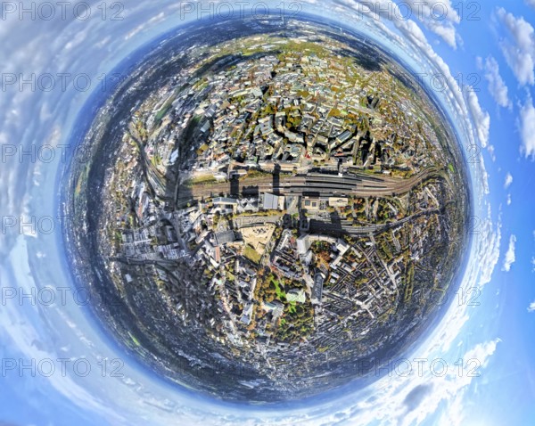 Aerial view, central station and city city center, below redesign of Essen campus construction site and planned new building for office campus, earth globe, fisheye shot, 360 degree view, tiny world, little planet, fisheye image, city center, Essen, Ruhr area, North Rhine-Westphalia, Germany, railway site, construction area, construction site, building plots, construction project, construction project, construction site, DE, Deutsche Bahn AG, Europe, fisheye lens, fisheye lens, tracks, large construction site, main train station, Little Planet, aerial view, aerial photography, aerial photography, new build, super wide angle lens, tiny world, overview, birds-eyes view, fisheye lens, insta360 camera, overview