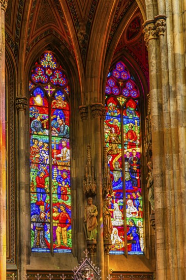 Colourful windows in the neo-gothic votive church, Vienna, Austria