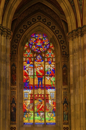 Colourful window in the neo-gothic votive church, Vienna, Austria