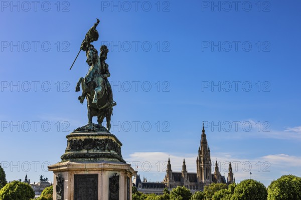 Monument of Archduke Karl, behind it the Town Hall with its neo-Gothic façade, Heldenplatz, Vienna, Austria