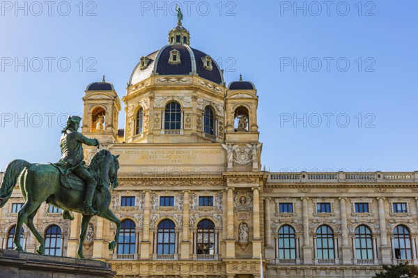 Horse-rider statue at Maria Theresia Memorial, Maria-Theresien-Platz, in the back the Natural History Museum, Vienna, Austria