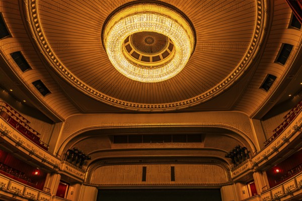 Large ceiling light in the large auditorium at the Vienna State Opera, Vienna, Austria