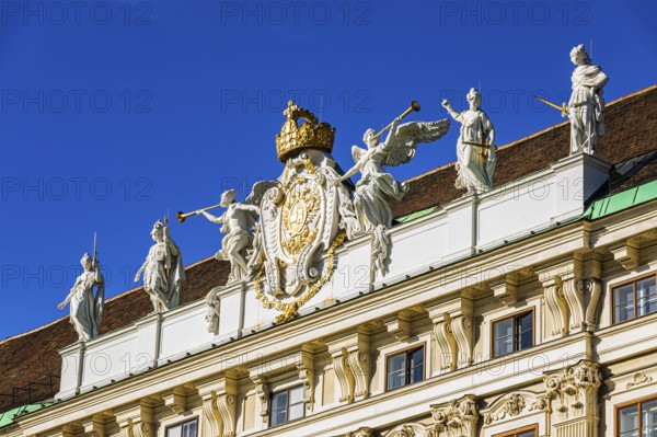 Angel statues on the roof of the Hofburg Imperial Palace, Vienna, Austria