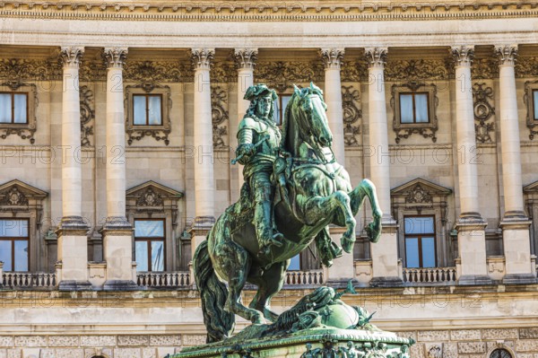 Monument to Prince Eugene, behind it the historic façade of the New Hofburg Imperial Palace, Heldenplatz, Vienna, Austria