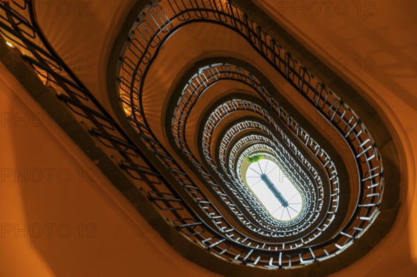 Staircase in an old Viennese house, view from below, Vienna, Austria