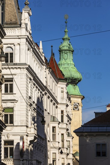 Historic facades and church with onion tower, near Neumarkt, Vienna, Austria