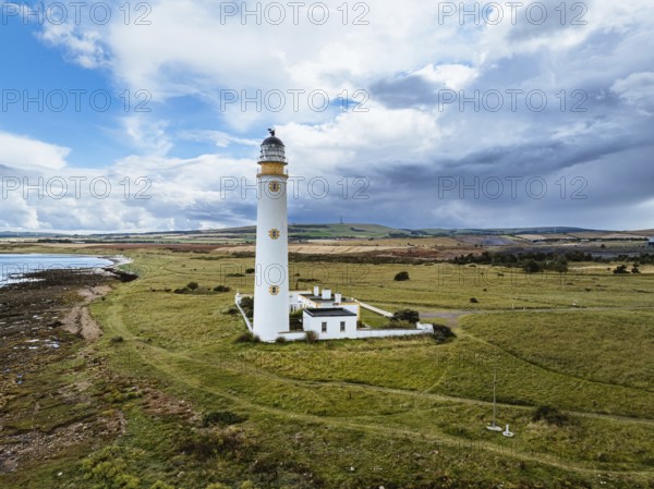 Rain Clouds over Barns Ness Lighthouse from a drone, Dunbar, East Lothian, Scotland, UK