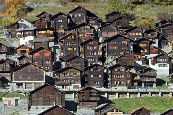 The village of Mâche with traditional Valais chalet architecture, Val d'Hérens, Valais, Switzerland