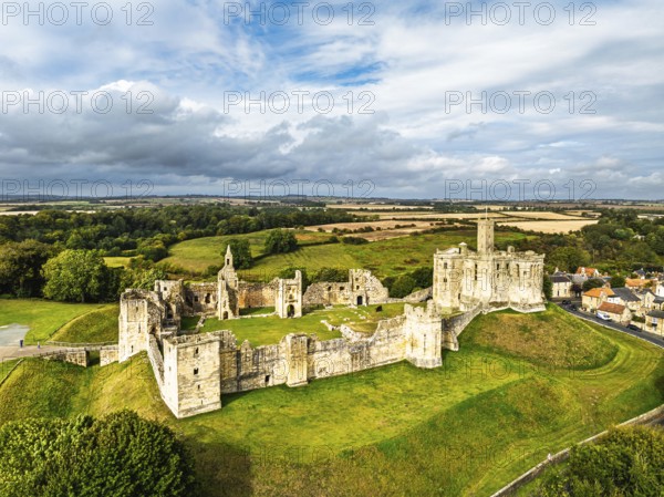 Warkworth Castle over River Coquet from a drone, Warkworth, Northumberland, England, United Kingdom