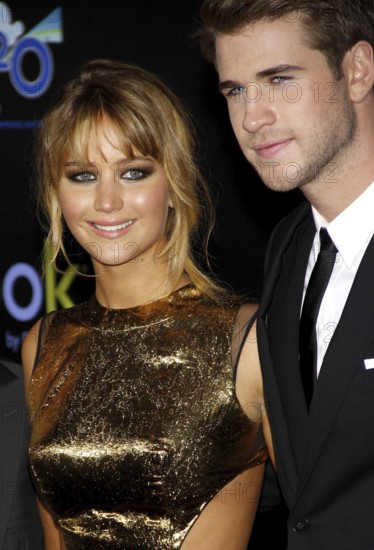 Jennifer Lawrence and Liam Hemsworth at the Los Angeles premiere of 'The Hunger Games' held at the Nokia Theatre L.A. Live in Los Angeles, USA on March 12, 2012, Los Angeles, CA, USA, Los Angeles, California, USA